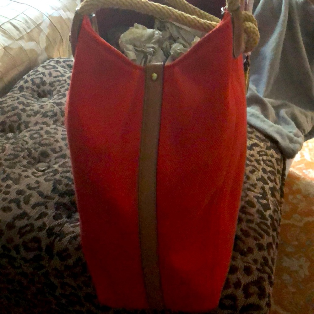 New Large Michael Kors Tote.  Tangerine canvas material with leather trim.